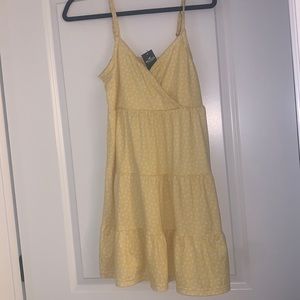Yellow sundress with white flowers